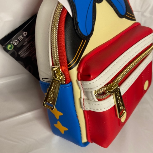 NWT Loungefly Disney Pinocchio Cosplay Wristlet (in original package) - Picture 3 of 9